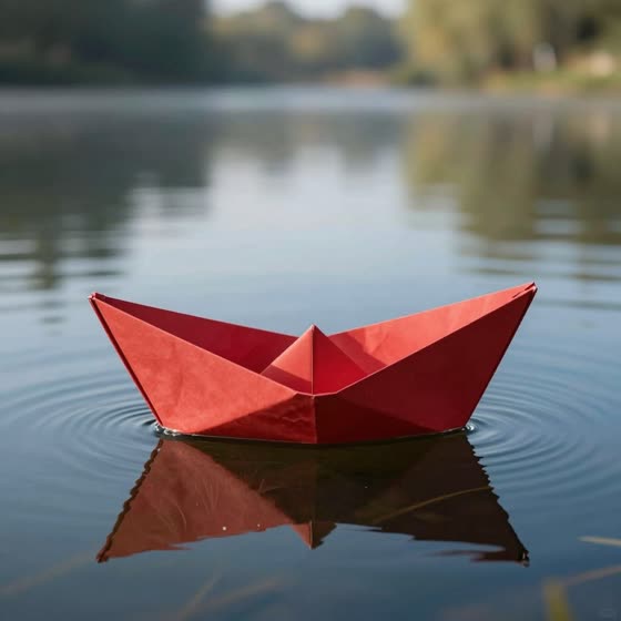 P-Image: Kata yang sama, mesin berbeda: “Perahu kertas merah mengapung di kolam tenang, cahaya pagi”. Pilih gaya yang Anda suka, lalu jadikan milik Anda.